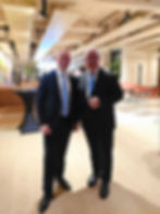 Two men at a business event