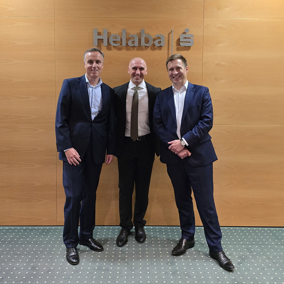 Picture of a group of 3 business men at Helaba´s Main Tower in Frankfurt