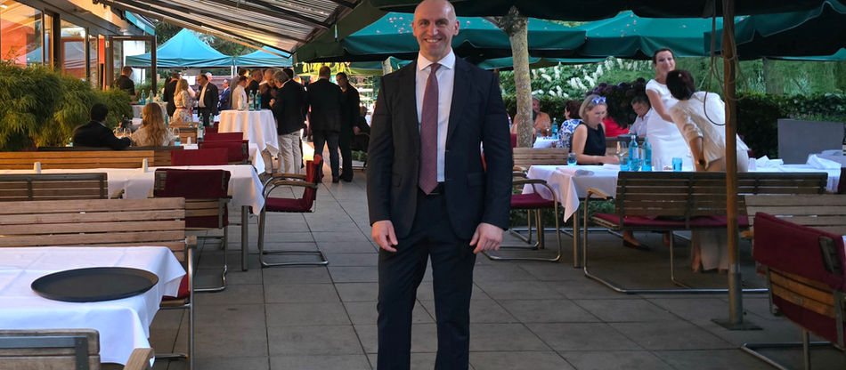 Man standing at a terrace