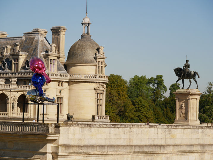 Patrick Laroche exhibition of his contemporary Vegetables sculpture: giant colorful artichokes at the Chateau de Chantilly, France