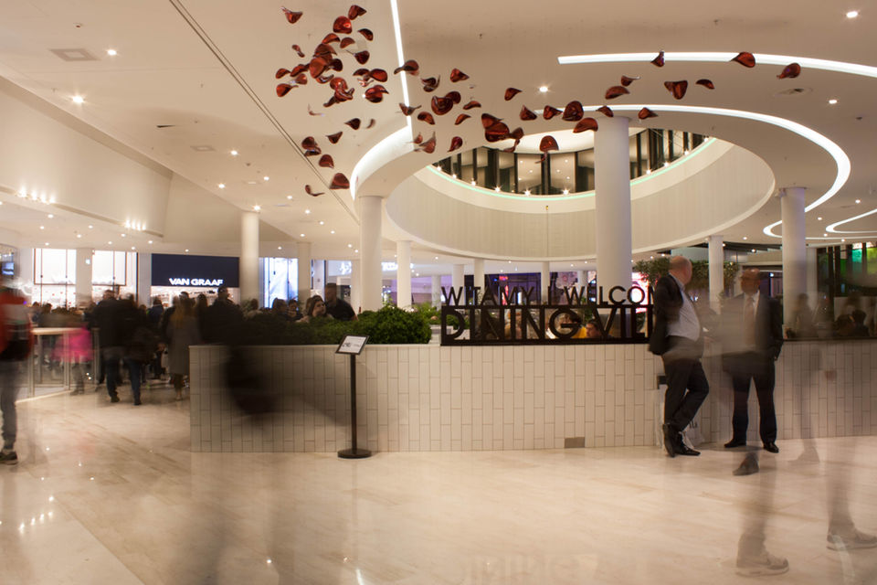 Patrick Laroche exhibition of his contemporary Vegetables sculpture installation: hanging rose petals ceiling in Poland