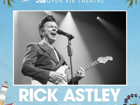 Rick Astley singing and playing guitar on a flyer for his live concert at Scarborough Open Air Theatre