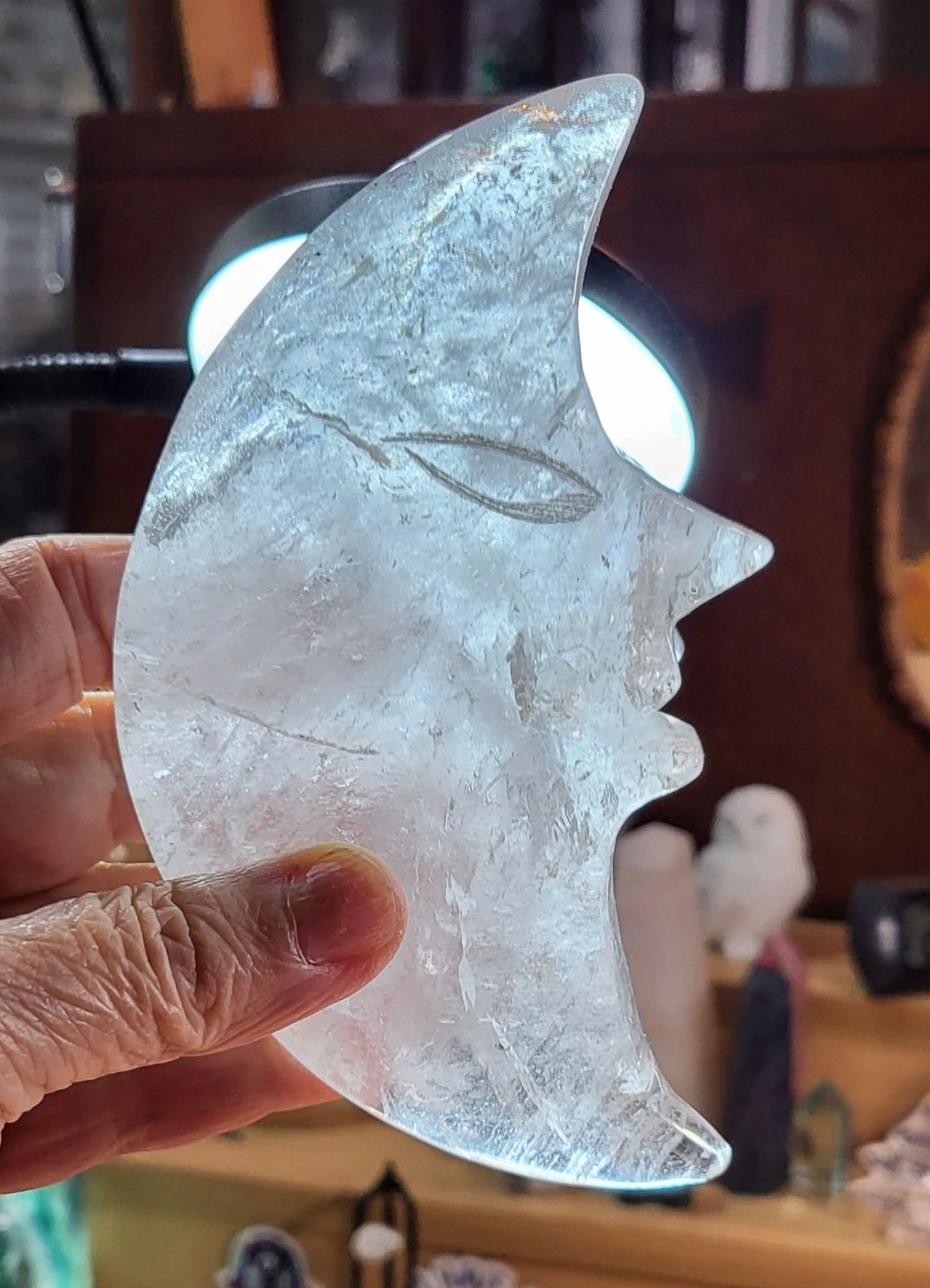 Clear quartz Moon face carving