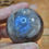 Thumbnail: Belomorite Moonstone and hematite sphere