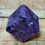 Thumbnail: Charoite cube beveled edges carving