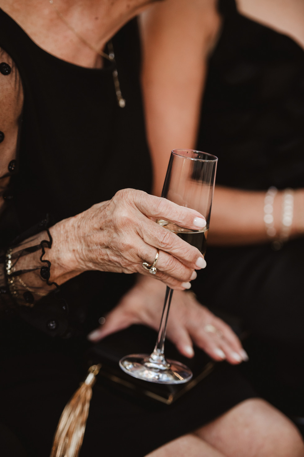 Romantic ceremony design featuring chandeliers and gold accents at The Addison Grove wedding venue.