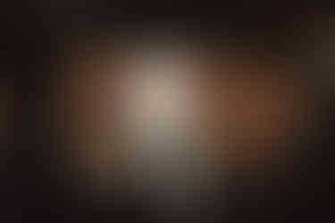 Guests dining along a single grand reception table during a luxury Addison Grove wedding