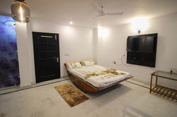 Suite bedroom with TV