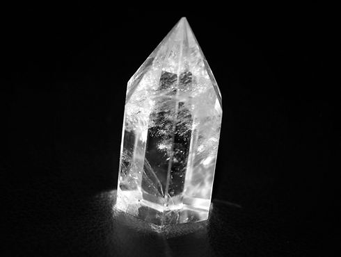 close-up-of-crystal-stone-glowing-in-darkroom-583919173-56f28e5d3df78ce5f83d7284.jpg