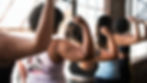 photo of 4 women's biceps looking strong
