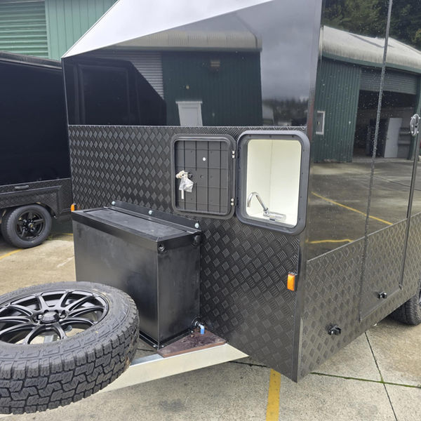 Community trailer with water station