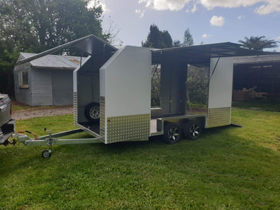 Custom made motorbike trailer with lift up doors on all four sides