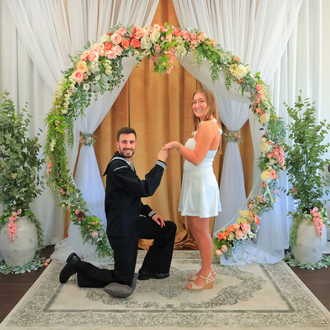 A happy and smiling newlywed couple enjoying their small intimate wedding. 