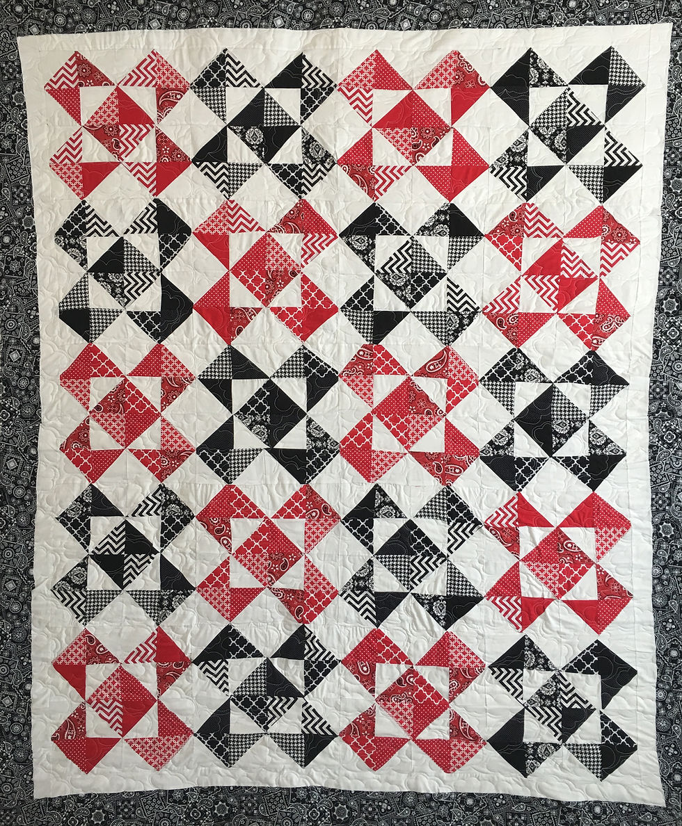Red and Black Half Square Triangles Quilt by Jefferson Sutton