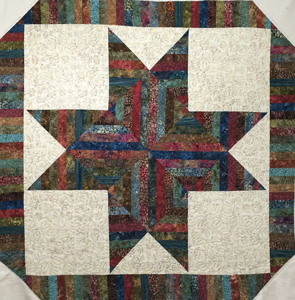 ohio star quilt with shades of blue and pink