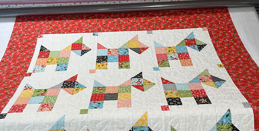 Machine quilting any and all sizes of quilting creations