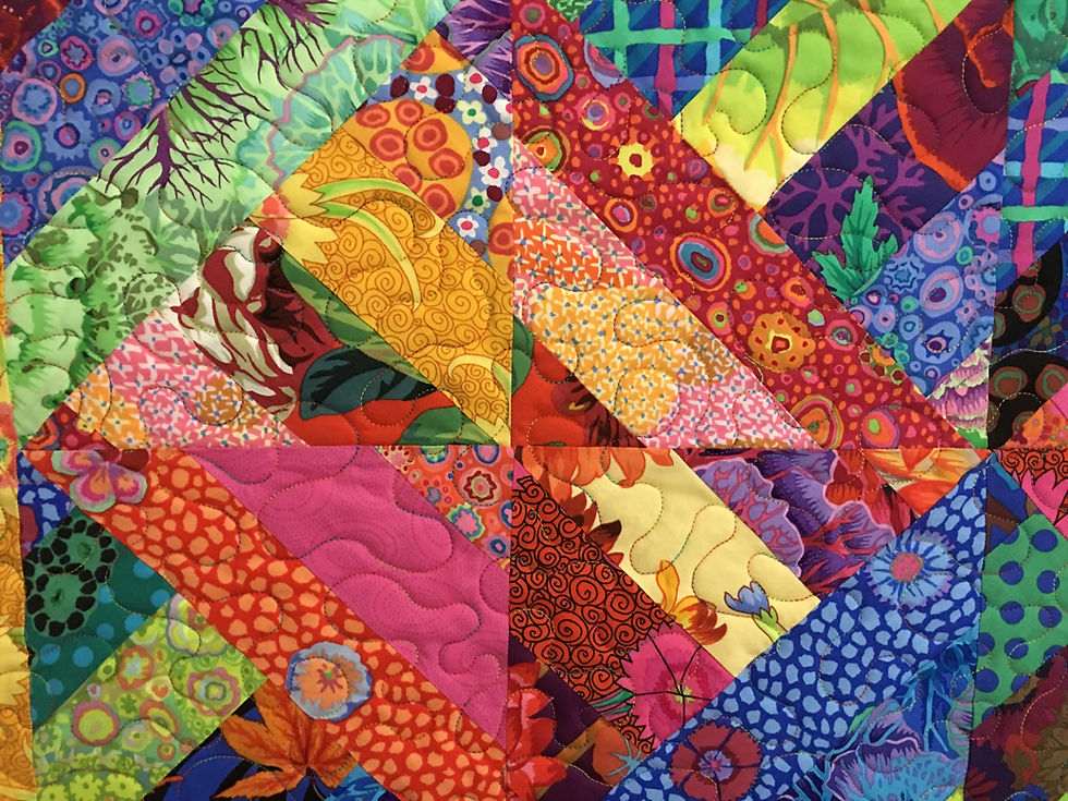 Meander quilting pattern on Stripey Half Square Triangles Quilt by Valarie Sherriff