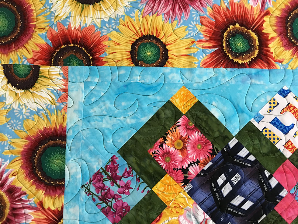 Meander Quilting pattern on Disappearing 9 Patch Quilt by Bridget Kauffman