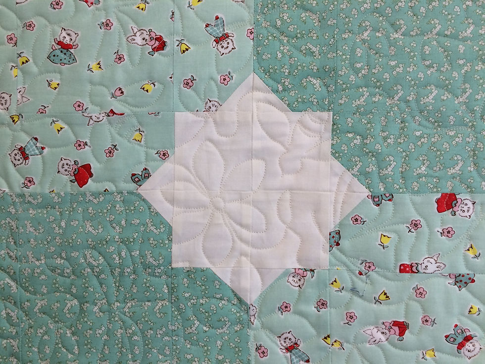 closeup of bumble bee quilting design on Milk Flower Sugar Baby Quilt