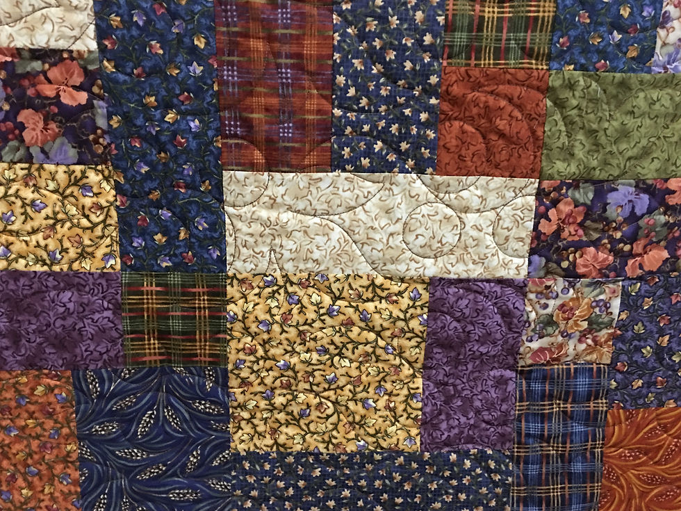 Leaves Quilting pattern on Yellow Brick Road Quilt by Sheila Stuckey.