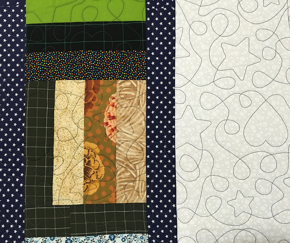 Stars and Hearts quilting design on Jelly Bean Dreaming Memories quilt by Judi Castro