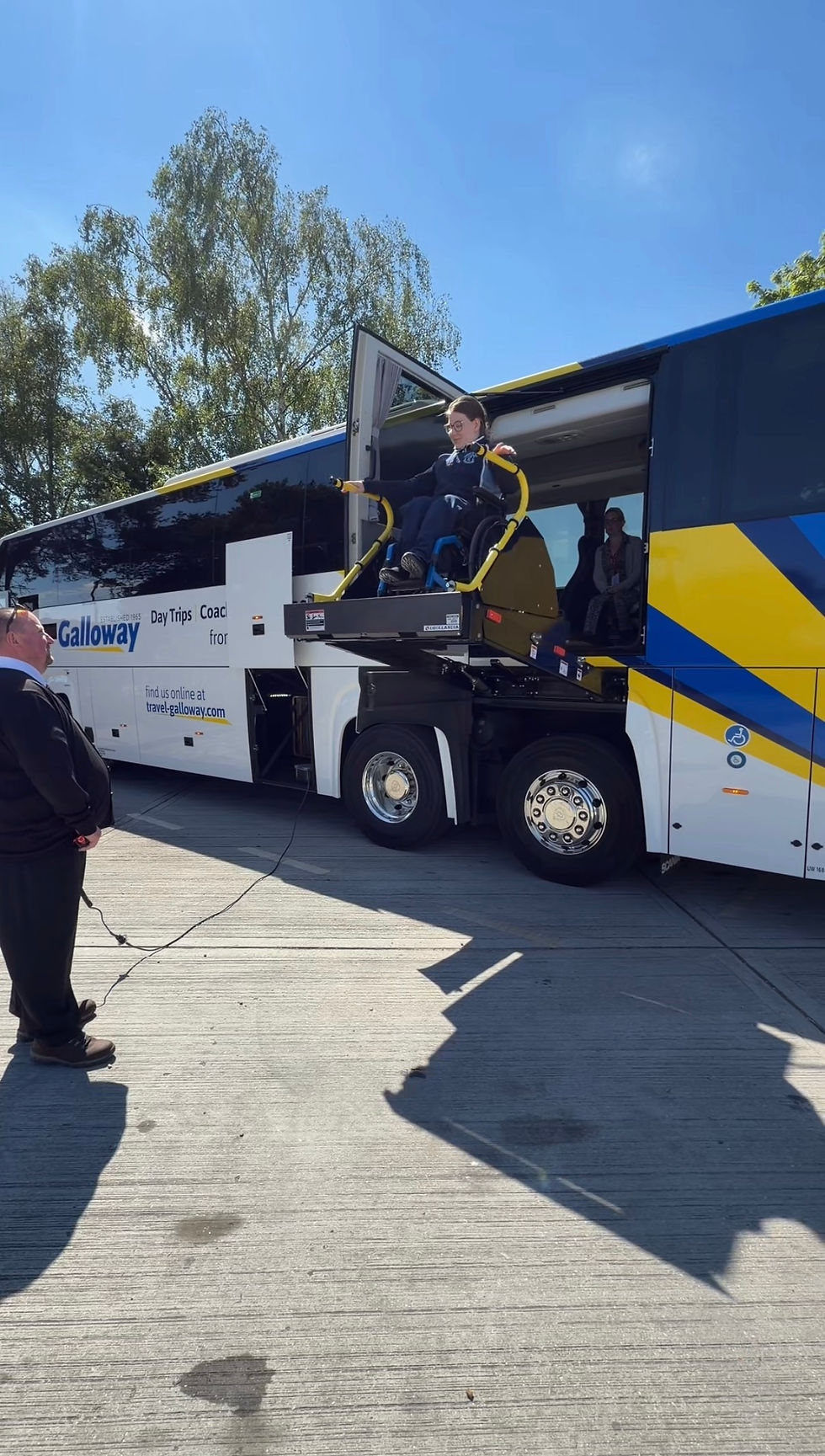 Accessible coach travel with wheelchair boarding lift