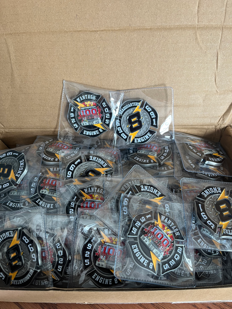 Bulk Order Wantagh Fire Department Challenge Coins in packaging.