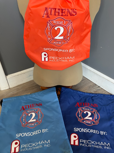 Custom Athens Fire Department FD String Backpacks Varying in colors.