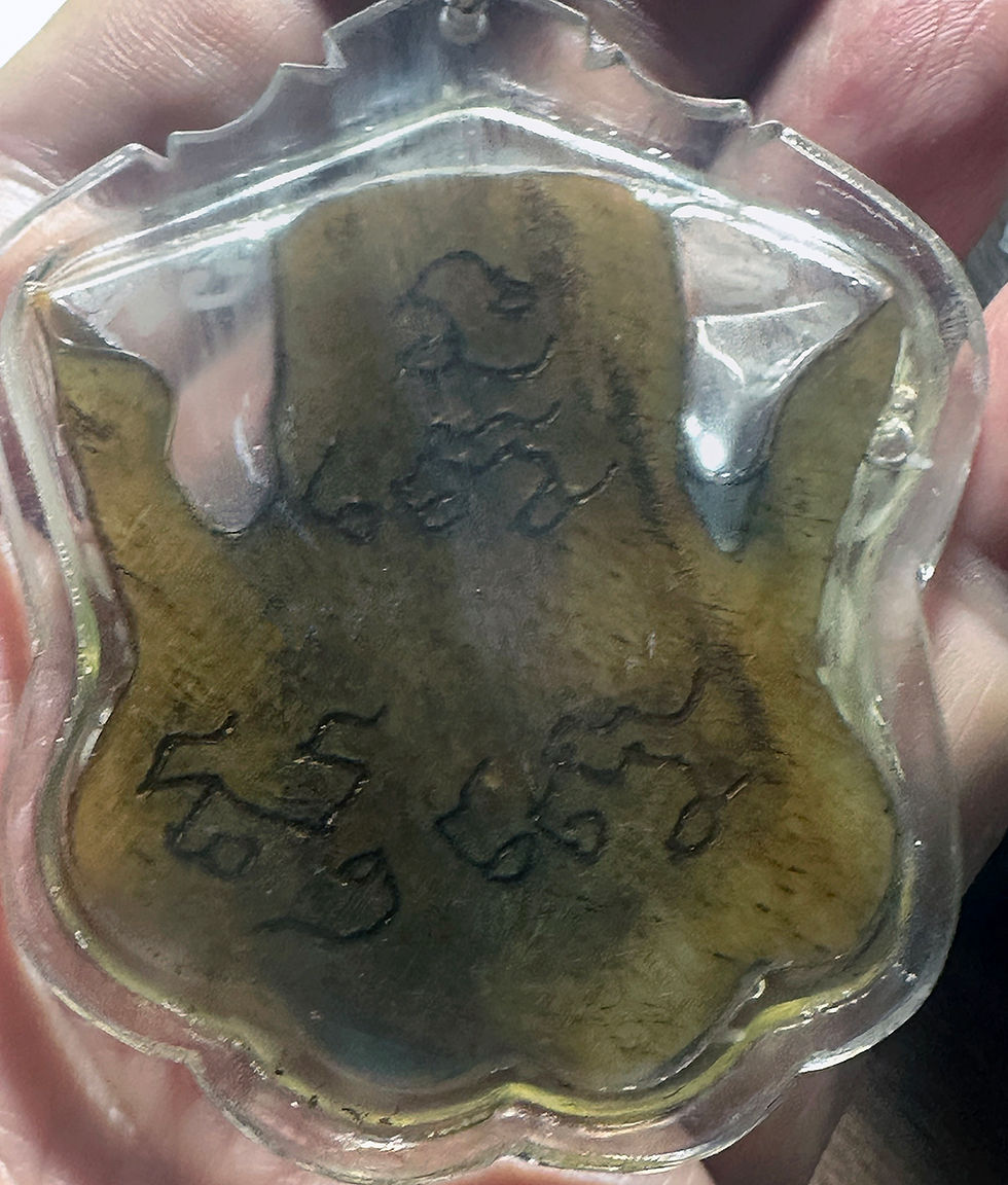 Thumbnail: An Original Luang Phor Pina Female Bone Mae Per in its original case