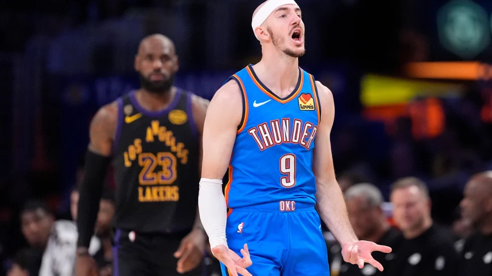 OKC Thunder's Alex Caruso celebrates vs LeBron James and the LA Lakers