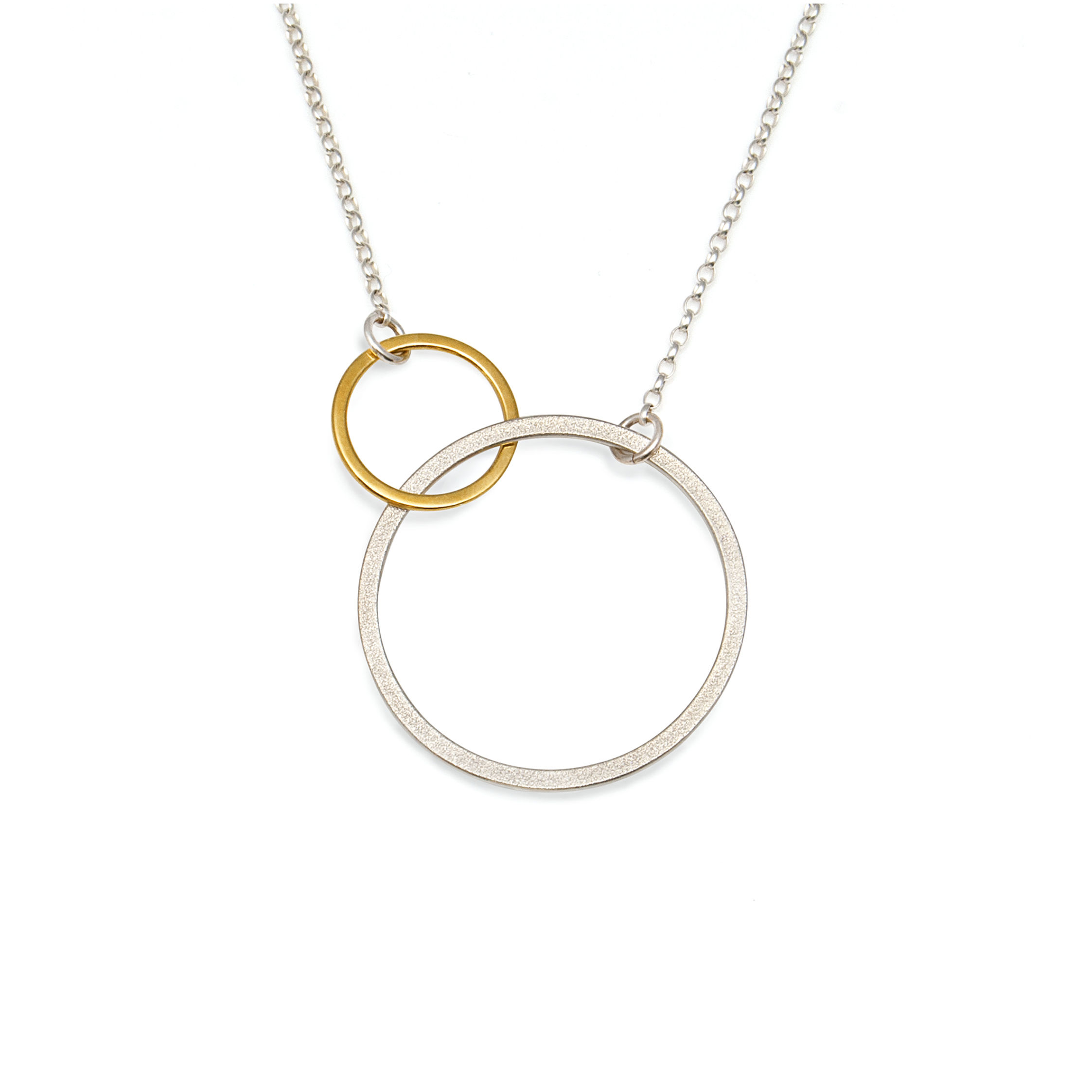 Ellipse double linked Circle Necklace in gold and silver with a shimmer texture pattern, close up