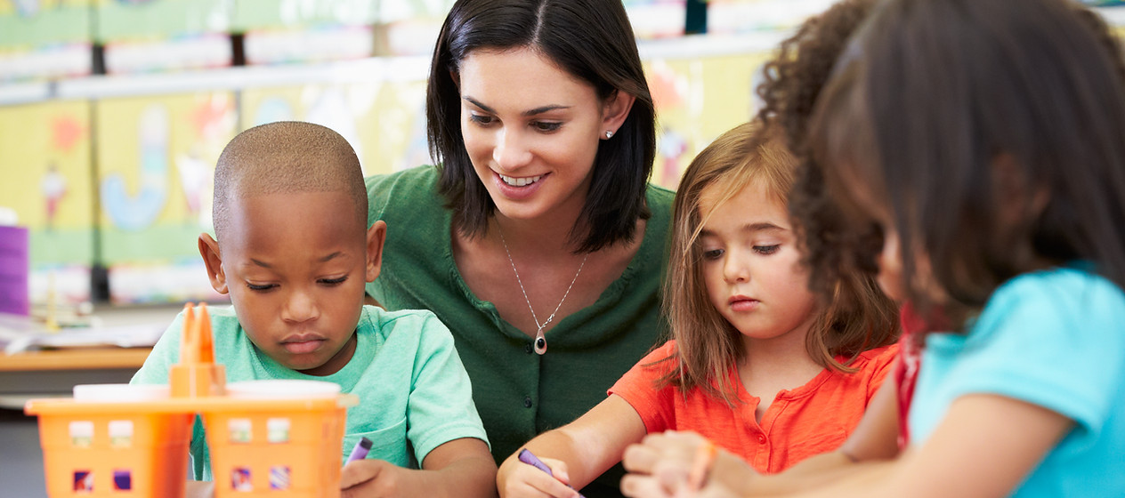 Preschool Teacher and Students