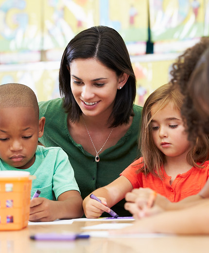 Preschool Teacher and Students