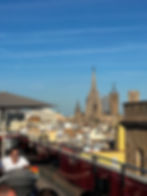 Views of La Sagrada Familia from the rooftop bar H1898 in Hotel 1898; A Local's Guide to Exploring Barcelona: The Perfect Itinerary of the Top Things to See and Do by Area