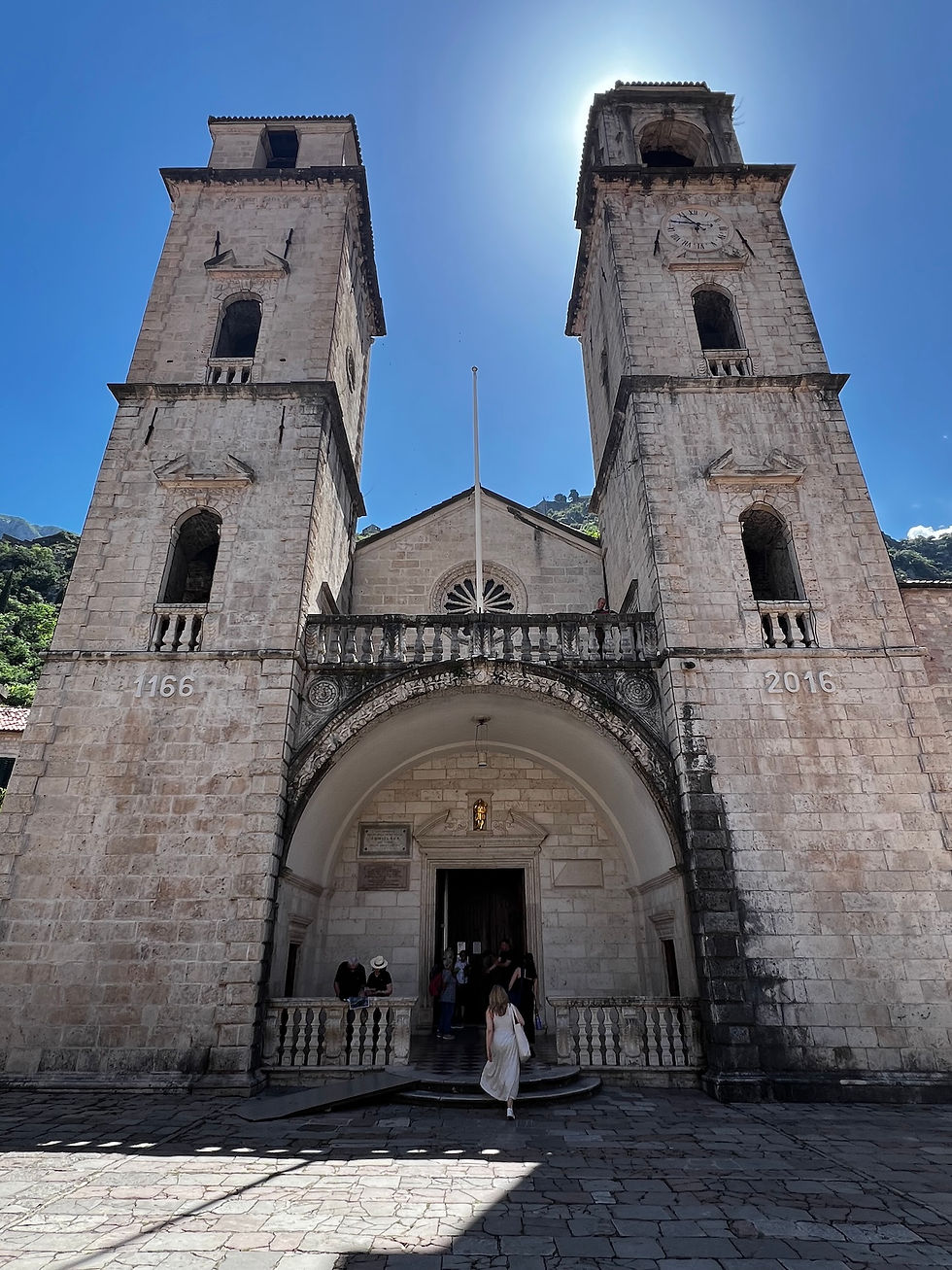 The Kotor Cathedral: the baroque bell towers were added in 1667 when the front was destroyed by earthquake; 1 Day in the Walled City of Kotor, Montenegro: the Top 10 Things to Focus on