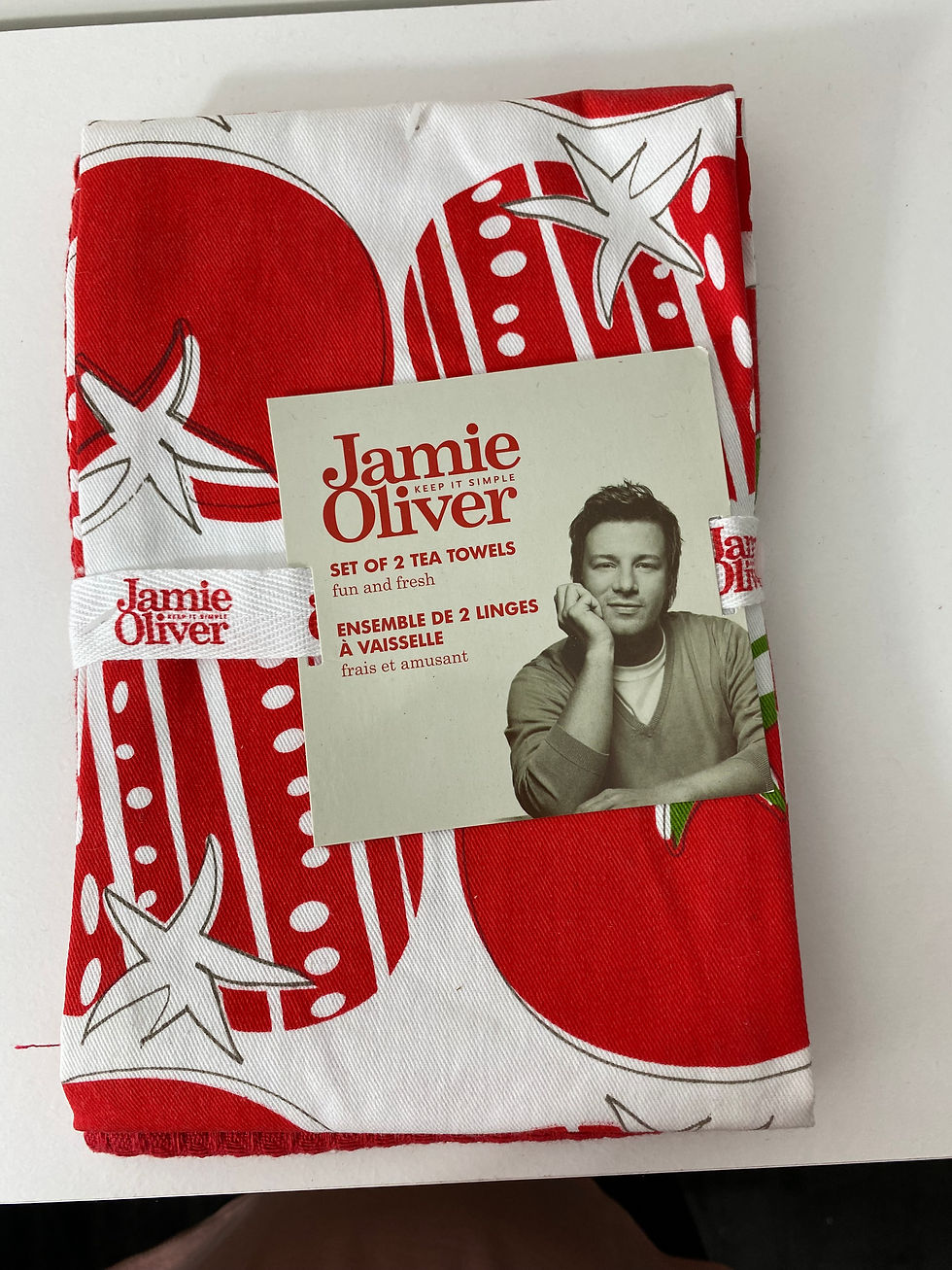 Jamie Oliver Red Tea Towel Set — Bright, bold and ready to add a little “yes, I absolutely meant to cook that” confidence to the kitchen. [Shop the red set →]