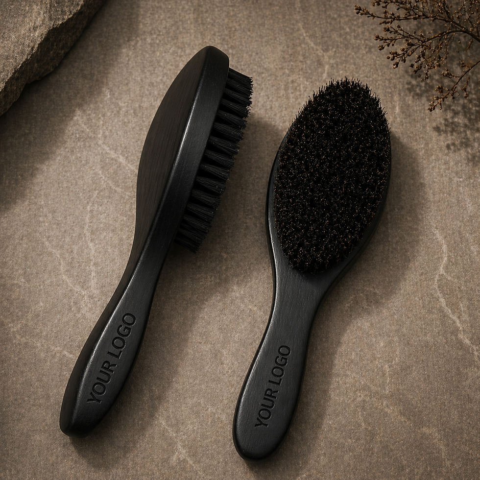 Black private label beard brushes on a stone surface.