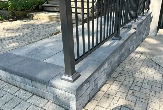 residential-streetside-walkway-with-railing.webp
