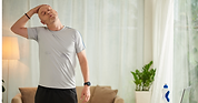 A person stretching their neck.