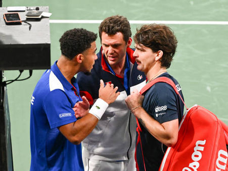 TWO CALLS LEAD TO FARCICAL SCENES AND FROSTY HANDSHAKE; PLAYERS NEED TO BE SEPARATED