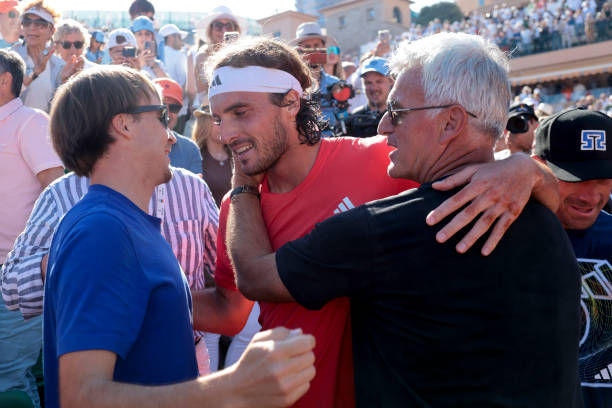 Stefanos Tsitsipas celebrates winning the 2024 Monte-Carlo title with his team, including father, Apostolos (right) (Getty/Jean Catuffe)