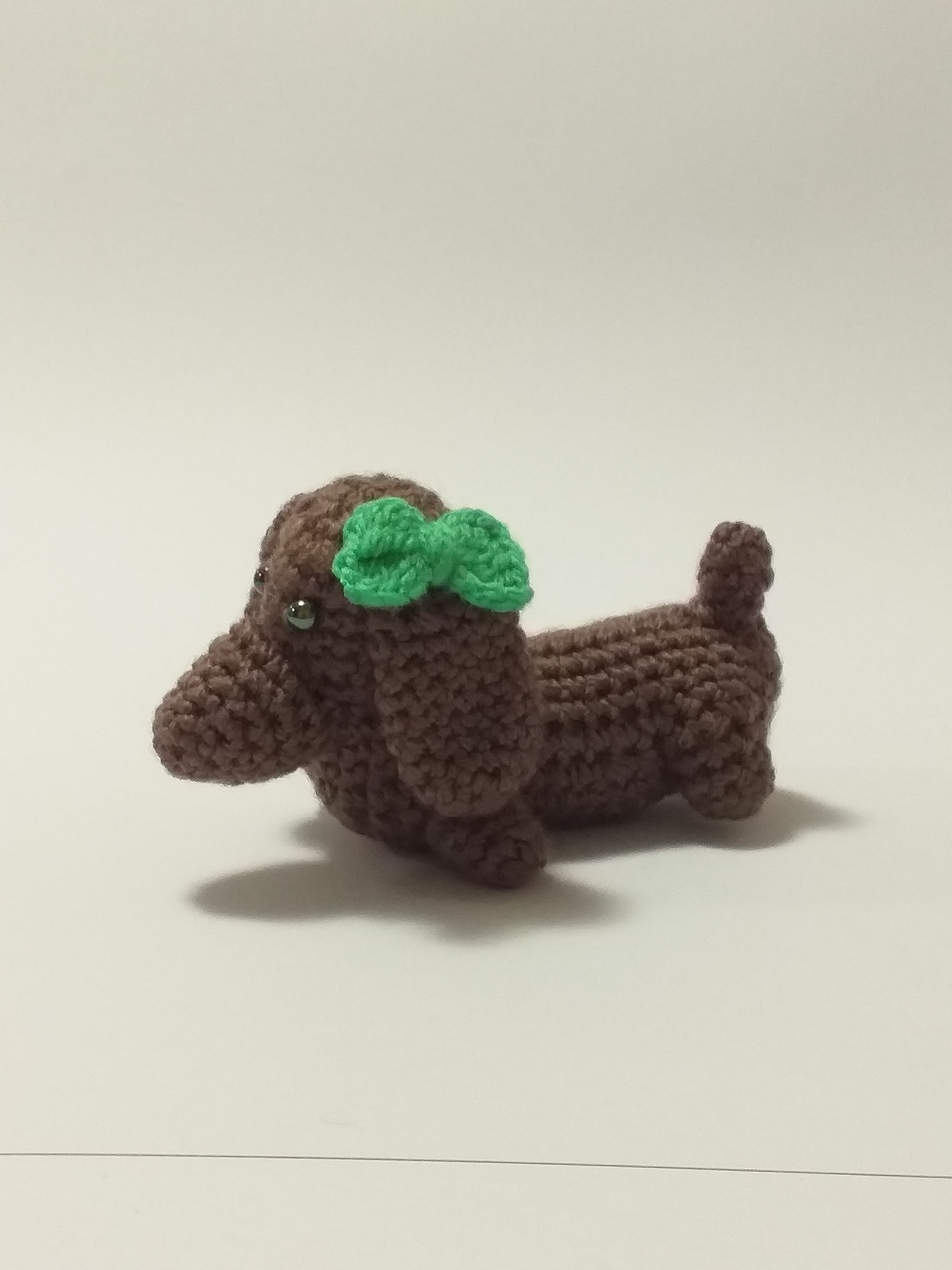 Perro Salchicha con moño