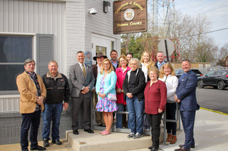 Representative Steve Smyk poses with supporters at the Sussex County Department of Elections after filing for Senate District 6 on April 1.
