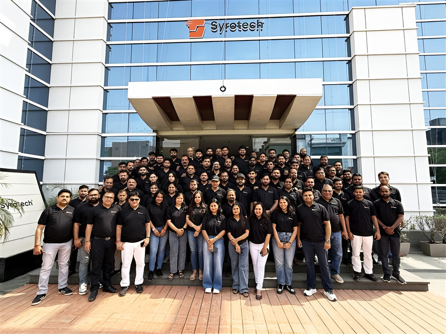 The Syrotech team outside the headquarters in Sector 63, Noida