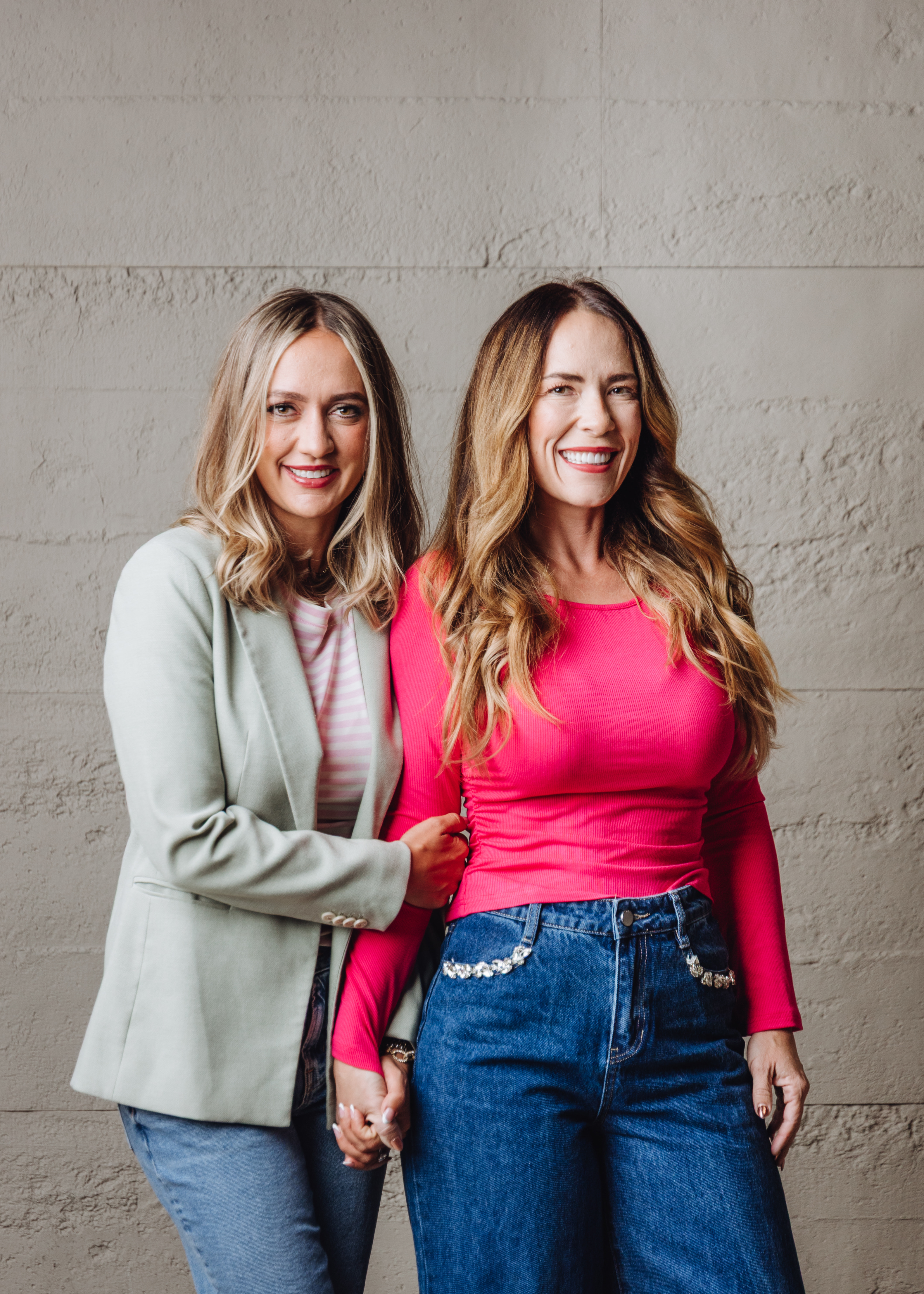 Mandy and Mel standing together in the studio