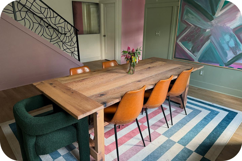 A dining room table built by Paper and Pipes. The view shows the side and top of the table. It easily seats 8.