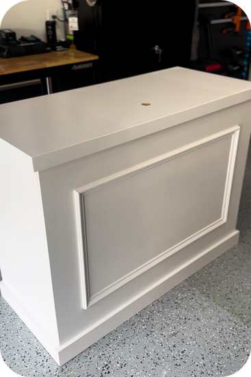 Simple white bar cart with paneling built by Knock on Wood.