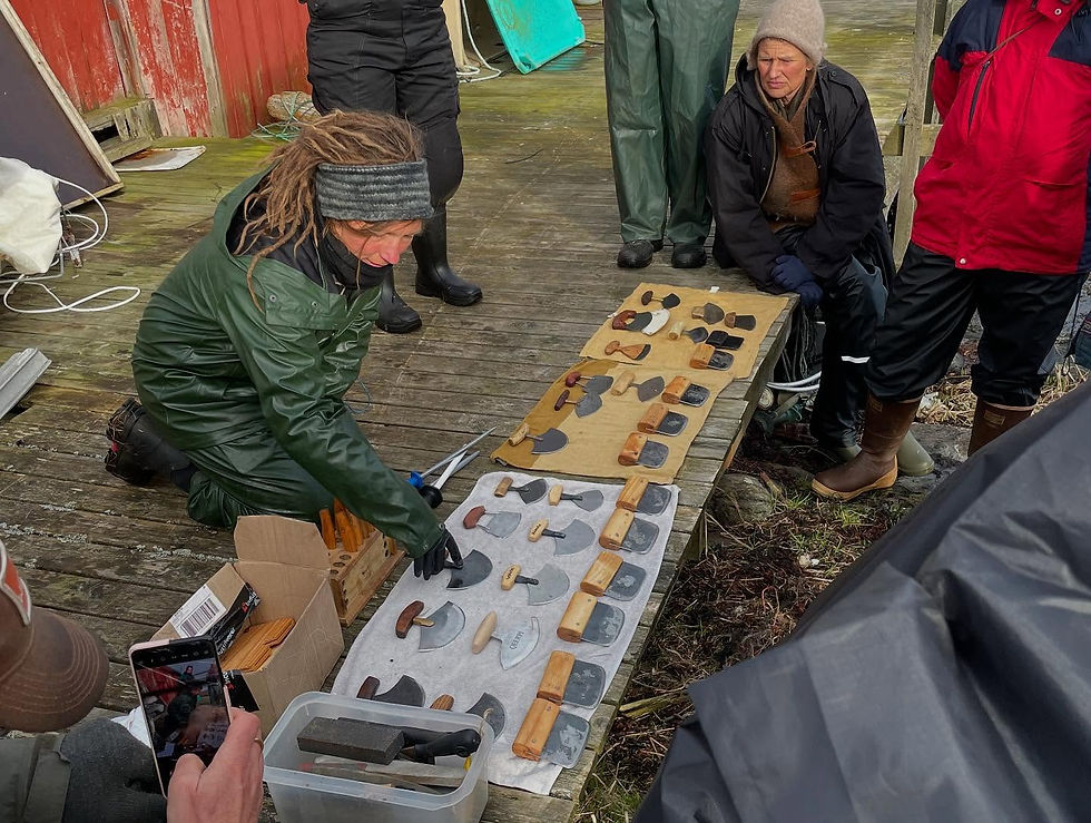 The gathering organizers lay out and describe various types of ulus, as well as their purposes for skinning seals.