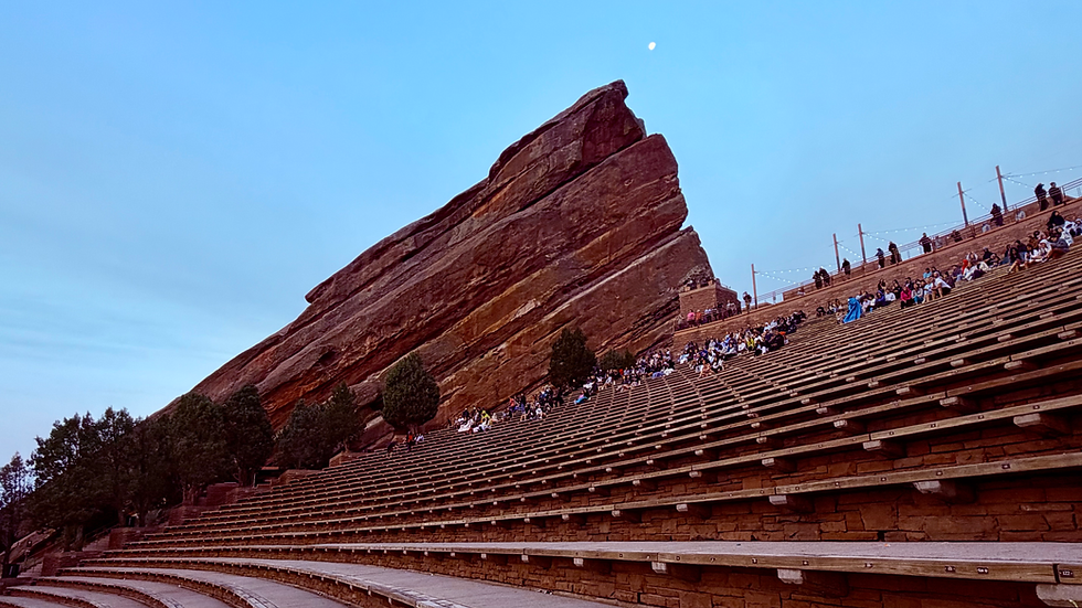 By 5 a.m., the amphitheater is already beginning to fill. Photographers compare camera settings, road trippers sip coffee, families bundle up in blankets, and everyone settles in to watch the morning unfold together. Photo credit: GreenSeaShells.com