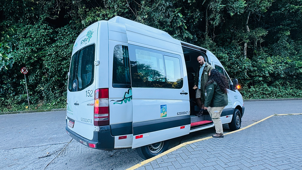 A van waits for passengers at Christ the Redeemer